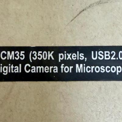 Sale Photo Thumbnail #580: Model DCM35. This camera is perfect for medical and lab equipment, devices, and applications. With a magnification range of 350K pixels, you can get high-quality images of your microscope specimens. The camera is made in Japan and comes with an extra lens