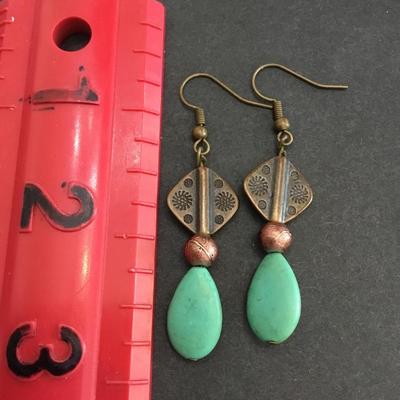 Beautiful BoHo faux turquoise stone bronze, toned dangle earrings. Very cute.
