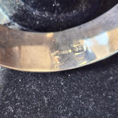 Sale Photo Thumbnail #255: Engraved, safety chain, snap closure.  2.5 inch diameter through the cuff.  1/2 inch wide