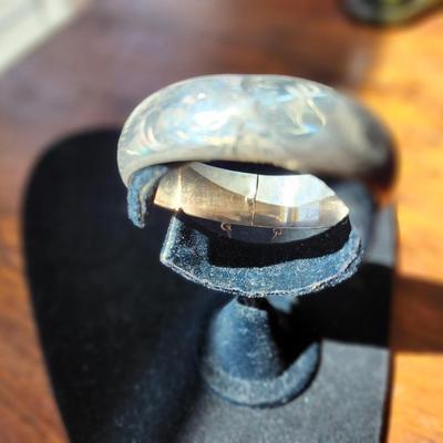 Sale Photo Thumbnail #256: Engraved, safety chain, snap closure.  2.5 inch diameter through the cuff.  1/2 inch wide