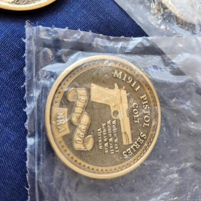 Sale Photo Thumbnail #276: or Commemorative Coins.
1 = NRA M 1911 Pistol Series Colt, uncirculated
2 = NRA Browning M2, uncirculated
3 = NRA M9 Pistol Series Beretta
4 = National Parks Centennial, Mount Rainer