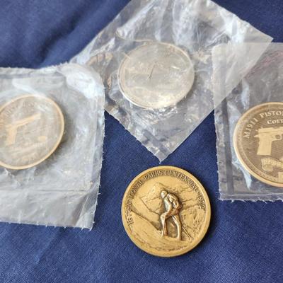 Sale Photo Thumbnail #277: or Commemorative Coins.
1 = NRA M 1911 Pistol Series Colt, uncirculated
2 = NRA Browning M2, uncirculated
3 = NRA M9 Pistol Series Beretta
4 = National Parks Centennial, Mount Rainer