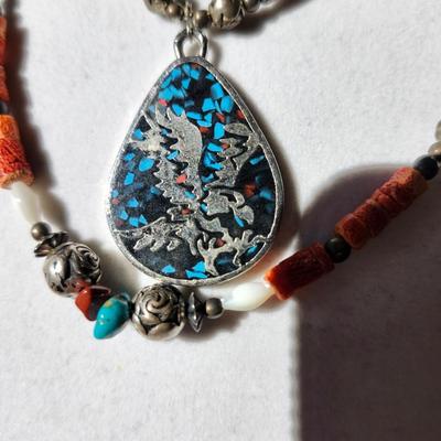 Sale Photo Thumbnail #289: 1970s style, coral and turquoise beads
About 26 inches long on the longest strand