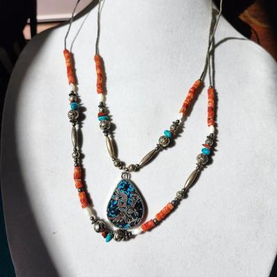 Sale Photo Thumbnail #290: 1970s style, coral and turquoise beads
About 26 inches long on the longest strand