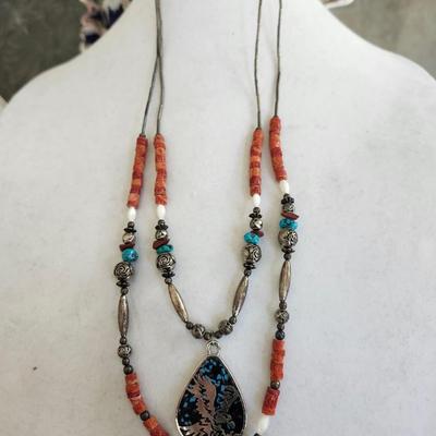 Sale Photo Thumbnail #288: 1970s style, coral and turquoise beads
About 26 inches long on the longest strand
