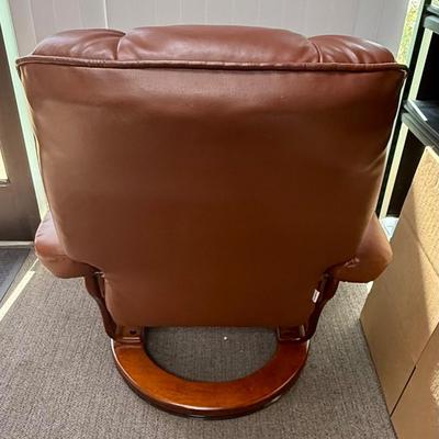 Sale Photo Thumbnail #589: Recliner chair and matching ottoman.  Good overall condition, some tiny spots in a few places on the material, not noticeable from a distance. Product details:
Color: Caramel Brown
Item dimensions (L x W x H): 42 x 30 x 40 inches
Material: Faux Leather, W