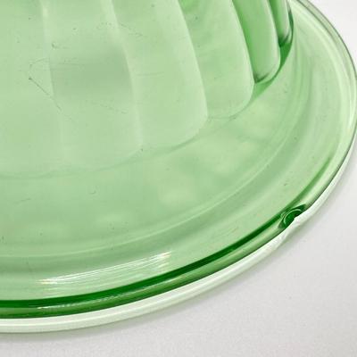 LOT 244: Four Uranium Glass Nesting Bowls