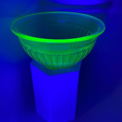 LOT 244: Four Uranium Glass Nesting Bowls