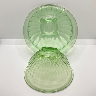 LOT 244: Four Uranium Glass Nesting Bowls