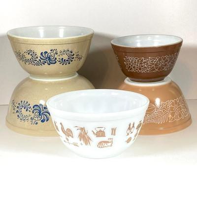 LOT 255: Collection of Five Pyrex Nesting Bowls - Early American, Homestead and Woodland Patterns