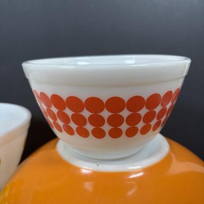 LOT 273: Pyrex Mixing Bowls: Pink Candy Stripe, New Dots (Orange), New Dots (Yellow), Daisey Cinderella