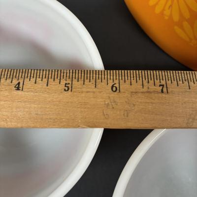 LOT 273: Pyrex Mixing Bowls: Pink Candy Stripe, New Dots (Orange), New Dots (Yellow), Daisey Cinderella