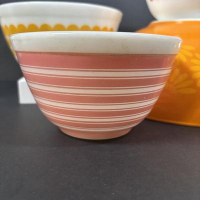 LOT 273: Pyrex Mixing Bowls: Pink Candy Stripe, New Dots (Orange), New Dots (Yellow), Daisey Cinderella