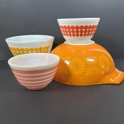 LOT 273: Pyrex Mixing Bowls: Pink Candy Stripe, New Dots (Orange), New Dots (Yellow), Daisey Cinderella