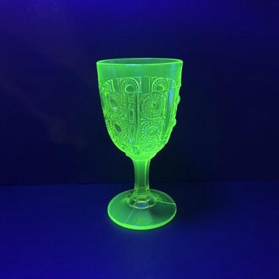 LOT 284: Amber Depression Glass Collection: Uranium Glass Wine Glass, Covered Candy Bowl, Sugar/Creamers, Console Bowl