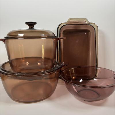 LOT 287: Pyrex Vision Cookware, Pyrex Amethyst Bowl & Baking Dish along with an Anchor Hocking Baking Dish