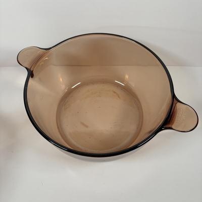 LOT 287: Pyrex Vision Cookware, Pyrex Amethyst Bowl & Baking Dish along with an Anchor Hocking Baking Dish