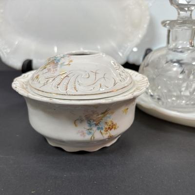 LOT 292: Vintage Vanity Jar w/Monogrammed Sterling Silver Lid, Crystal Perfume Bottle, Porcelain Hair Receiver, Milk Glass Trays &...