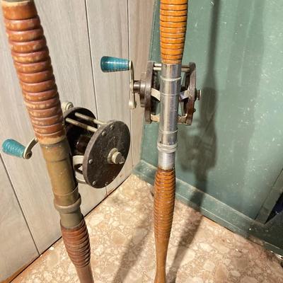 LOT 309: Set of (2) Wooden Fishing Poles with Penn Reels No 35 and No 79 & Wicker Fishing Creel