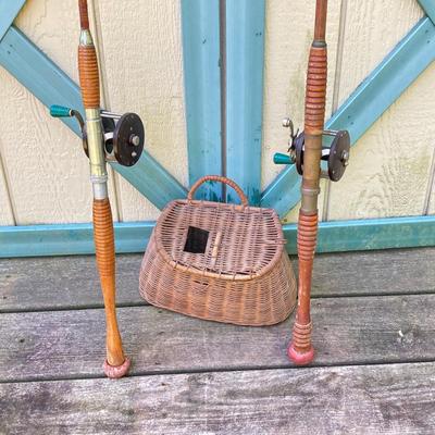 LOT 309: Set of (2) Wooden Fishing Poles with Penn Reels No 35 and No 79 & Wicker Fishing Creel
