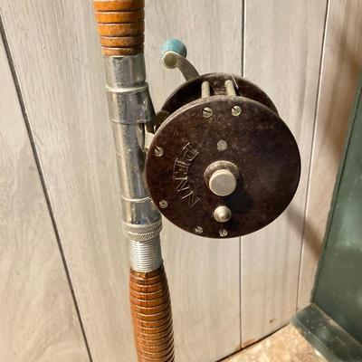 LOT 309: Set of (2) Wooden Fishing Poles with Penn Reels No 35 and No 79 & Wicker Fishing Creel