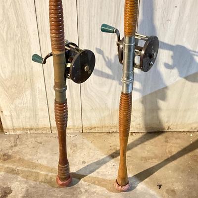 LOT 309: Set of (2) Wooden Fishing Poles with Penn Reels No 35 and No 79 & Wicker Fishing Creel