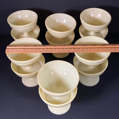 LOT 335: Pale Yellow / White Dinnerware Collection
