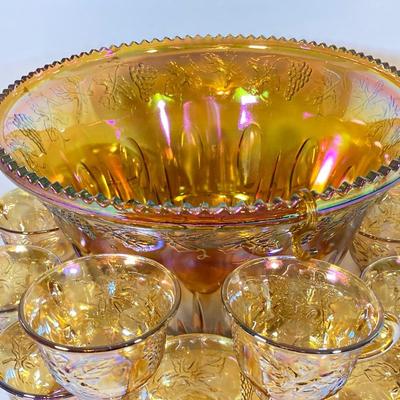 LOT 337: Dazzling Carnival Glass Punch Bowl with Twelve Cups