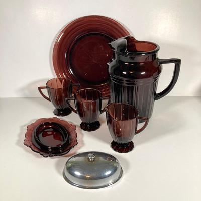 LOT 339: Large Collection of Amethyst Glass Dinnerware