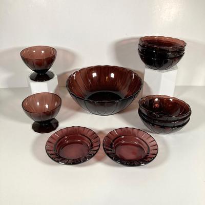 LOT 339: Large Collection of Amethyst Glass Dinnerware