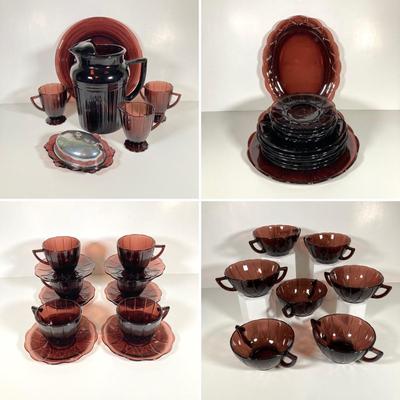 LOT 339: Large Collection of Amethyst Glass Dinnerware