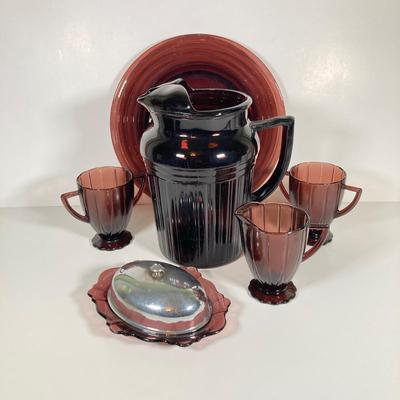 LOT 339: Large Collection of Amethyst Glass Dinnerware