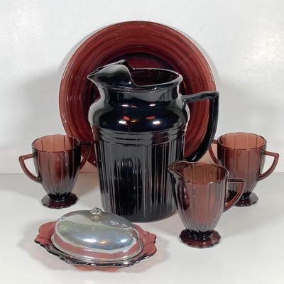 LOT 339: Large Collection of Amethyst Glass Dinnerware