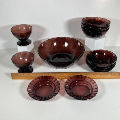 LOT 339: Large Collection of Amethyst Glass Dinnerware