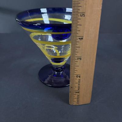 LOT 382: Art Glass Collection: Blenko colonial Williamsburg Restoration Goblet w/Air-Twist Stem, Kosta Boda Martini, Green Hobnail Piggy...