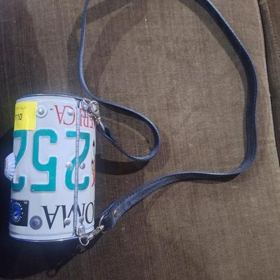 Sale Photo Thumbnail #69: purse made from a re-purposed Oklahoma license plate.   Made by little earth company.

Tags included