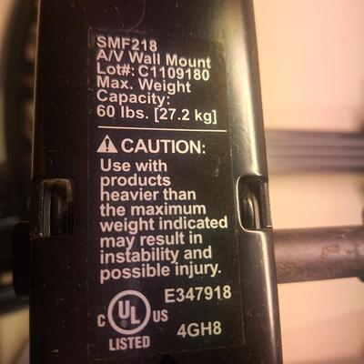 Sale Photo Thumbnail #100: This is the wall mount only, it does not have the bolts for the wall or the screw for the TV bracket or the set screw that secures the bracket to the mount.  We think the brand is sanus if you want to research that to get instructions.