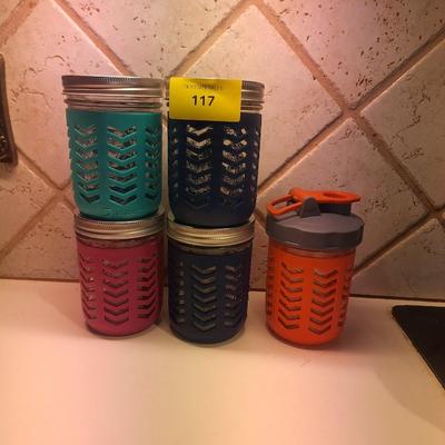 Sale Photo Thumbnail #103: 5 jars, 4 with regular lids one with a pop top lid all have silicone sleeves for easy grip