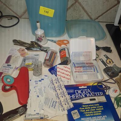Sale Photo Thumbnail #147: misc items -Bandaids, thermometer, toothpicks and random things all in a storage container