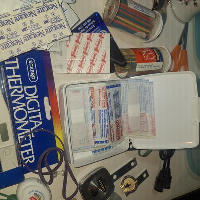 Sale Photo Thumbnail #148: misc items -Bandaids, thermometer, toothpicks and random things all in a storage container