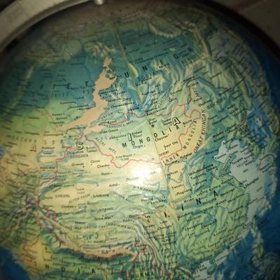 Sale Photo Thumbnail #164: This globe has a raised survace for mountains and such   It is old enough that it shows Czechslovakia and USSR as countries.