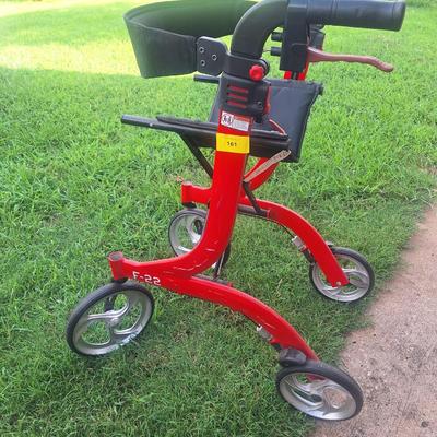 Sale Photo Thumbnail #265: This walker has large wheels folds up easily, it is a heavy duty walker- good for using outdoors and good for a larger person.
