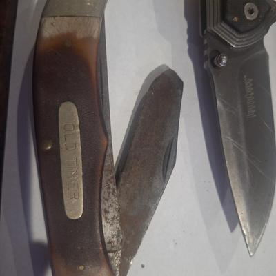 Sale Photo Thumbnail #367: bundle of knives etc  the big old timer is difficult to open and tip broken off.
