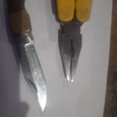 Sale Photo Thumbnail #369: bundle of knives etc  the big old timer is difficult to open and tip broken off.