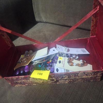 Sale Photo Thumbnail #375: this is a misc bundle of jewelry in the box it may be tangled or earrings may be mismatched.  It looks to be dollar store items