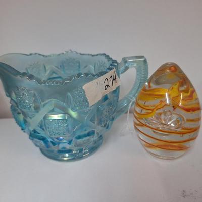 Sale Photo Thumbnail #548: glass paperweight and small glass pitcher.  The egg shaped paperweight has been dropped and has a small spot on it's side, see all photos.