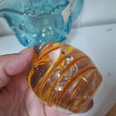 Sale Photo Thumbnail #549: glass paperweight and small glass pitcher.  The egg shaped paperweight has been dropped and has a small spot on it's side, see all photos.