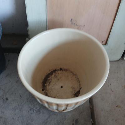 Two rolls of landscape fabric, ceramic pot, wooden frame and more