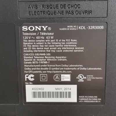 LOT 11B: Sony 32" TV and Remote with Glass Door Two Shelf Stand on Wheels
