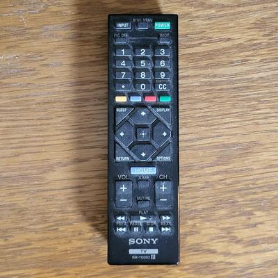 LOT 11B: Sony 32" TV and Remote with Glass Door Two Shelf Stand on Wheels